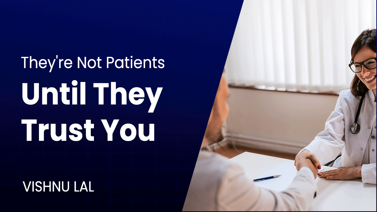 Doctor shaking hands with a patient with the text "They’re Not Patients Until They Trust You" emphasising trust in healthcare.